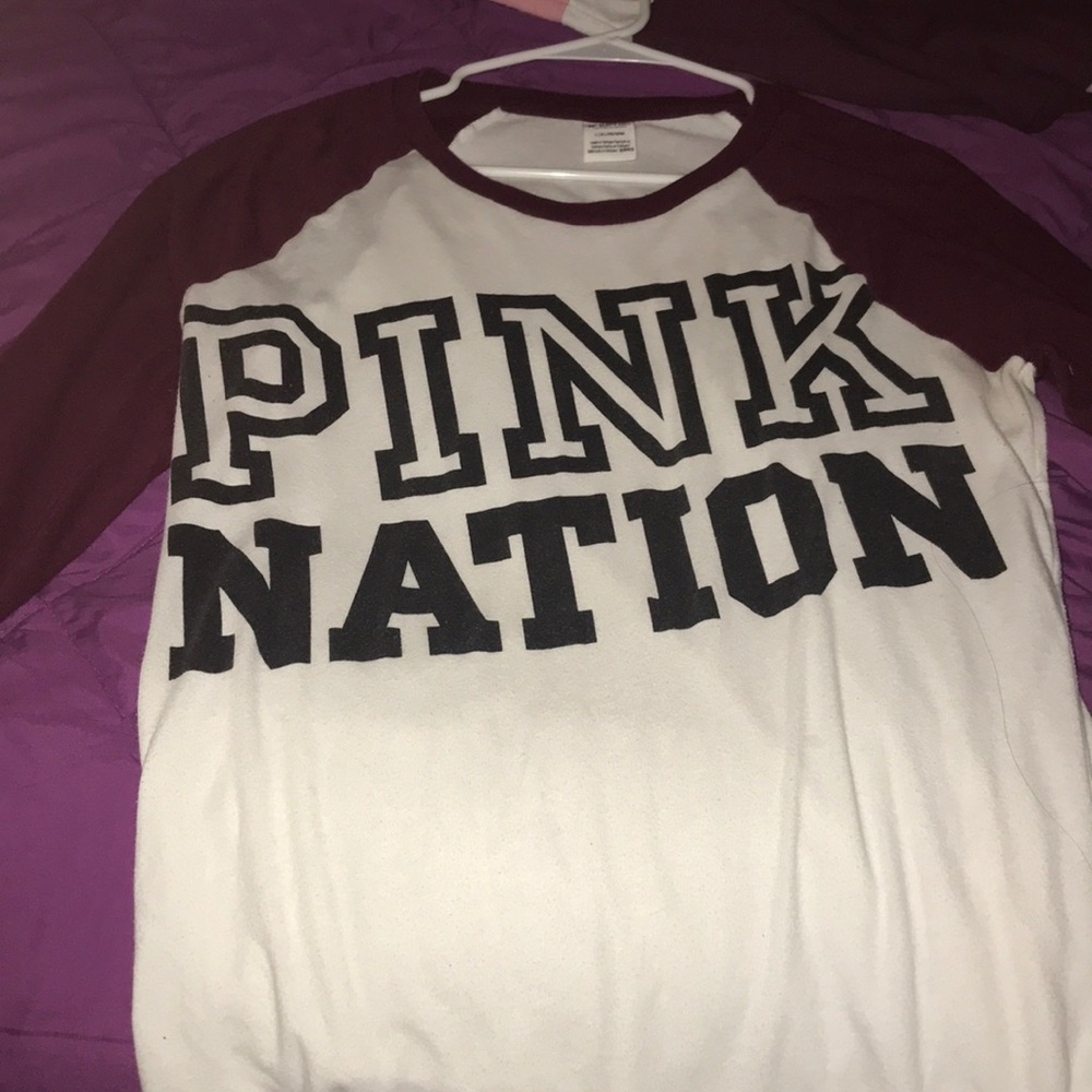 A Victoria’s Secret pink shirt